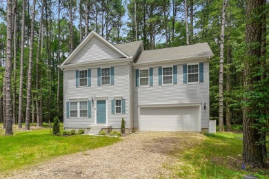 Welcome to your dream home nestled at the end of a serene on Captains Cove Golf and Yacht Club in Virginia - for sale on GolfHomes.com, golf home, golf lot