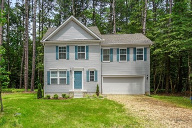 Welcome to your dream home nestled at the end of a serene on Captains Cove Golf and Yacht Club in Virginia - for sale on GolfHomes.com, golf home, golf lot