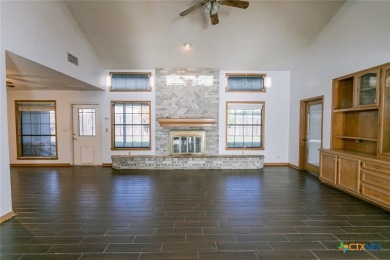 Welcome to 102 Tracy Ln, a stunning, move-in-ready home nestled on Victoria Country Club in Texas - for sale on GolfHomes.com, golf home, golf lot