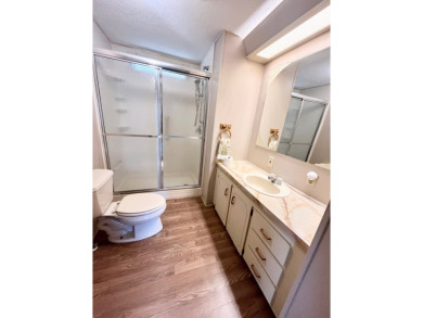 Looking for a well-maintained home in a vibrant gated golf on Pine Lakes Country Club in Florida - for sale on GolfHomes.com, golf home, golf lot
