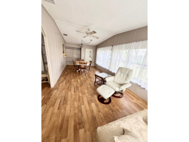 Looking for a well-maintained home in a vibrant gated golf on Pine Lakes Country Club in Florida - for sale on GolfHomes.com, golf home, golf lot