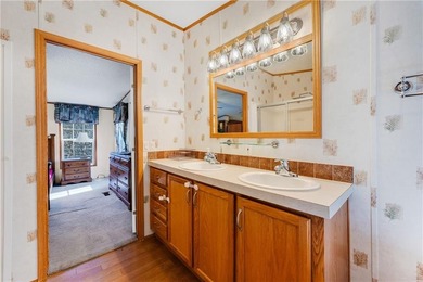 Welcome to a peaceful retreat where comfort, convenience, and on Holiday Island Executive Golf Course in Arkansas - for sale on GolfHomes.com, golf home, golf lot