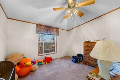 Welcome to a peaceful retreat where comfort, convenience, and on Holiday Island Executive Golf Course in Arkansas - for sale on GolfHomes.com, golf home, golf lot