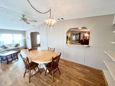 Looking for a well-maintained home in a vibrant gated golf on Pine Lakes Country Club in Florida - for sale on GolfHomes.com, golf home, golf lot