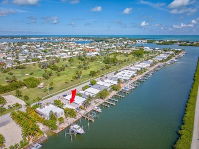 Dockage defines the lifestyle at this updated two-bedroom on Key Colony Beach Golf Course in Florida - for sale on GolfHomes.com, golf home, golf lot