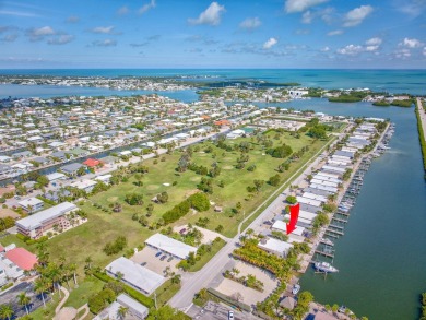 Dockage defines the lifestyle at this updated two-bedroom on Key Colony Beach Golf Course in Florida - for sale on GolfHomes.com, golf home, golf lot