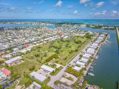 Dockage defines the lifestyle at this updated two-bedroom on Key Colony Beach Golf Course in Florida - for sale on GolfHomes.com, golf home, golf lot