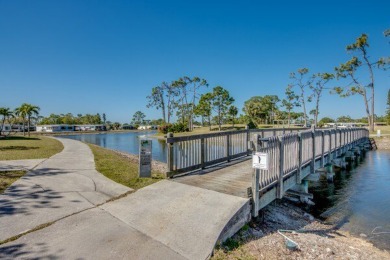 Looking for a well-maintained home in a vibrant gated golf on Pine Lakes Country Club in Florida - for sale on GolfHomes.com, golf home, golf lot