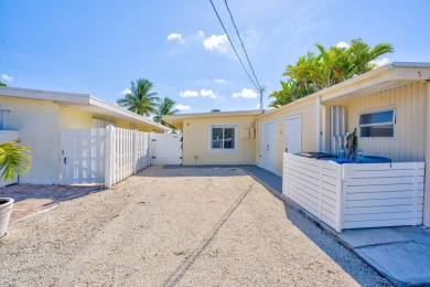 Dockage defines the lifestyle at this updated two-bedroom on Key Colony Beach Golf Course in Florida - for sale on GolfHomes.com, golf home, golf lot