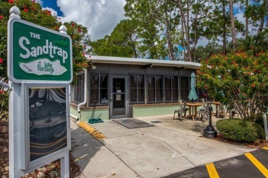 Looking for a well-maintained home in a vibrant gated golf on Pine Lakes Country Club in Florida - for sale on GolfHomes.com, golf home, golf lot