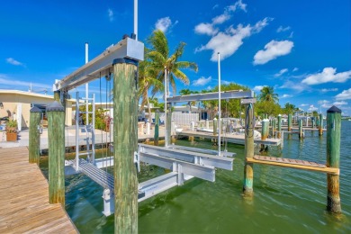 Dockage defines the lifestyle at this updated two-bedroom on Key Colony Beach Golf Course in Florida - for sale on GolfHomes.com, golf home, golf lot