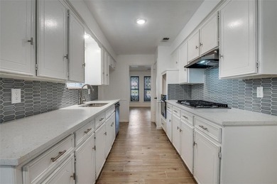 Beautifully updated home featuring a new roof, recent foundation on The Golf Club of Dallas in Texas - for sale on GolfHomes.com, golf home, golf lot