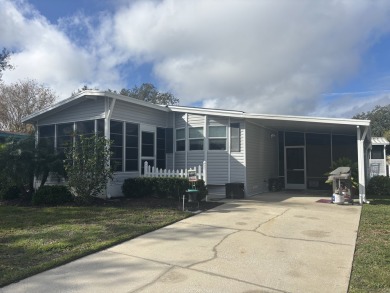 This home is located within a 55 + resort style leased land on Big Cypress Golf and Country Club in Florida - for sale on GolfHomes.com, golf home, golf lot
