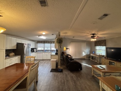 This home is located within a 55 + resort style leased land on Big Cypress Golf and Country Club in Florida - for sale on GolfHomes.com, golf home, golf lot