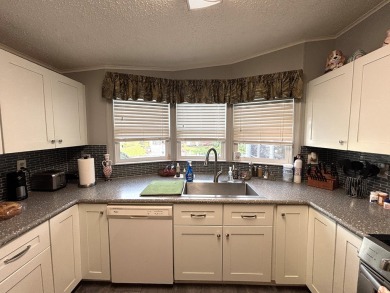 This home is located within a 55 + resort style leased land on Big Cypress Golf and Country Club in Florida - for sale on GolfHomes.com, golf home, golf lot