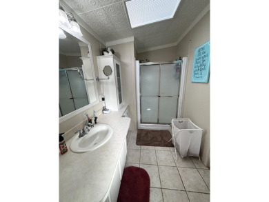 This home is located within a 55 + resort style leased land on Big Cypress Golf and Country Club in Florida - for sale on GolfHomes.com, golf home, golf lot