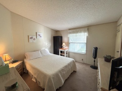 This home is located within a 55 + resort style leased land on Big Cypress Golf and Country Club in Florida - for sale on GolfHomes.com, golf home, golf lot