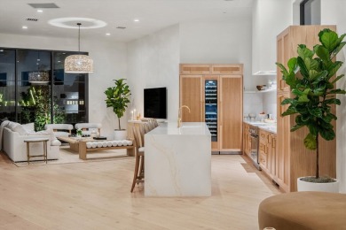 Experience luxury living in this exquisitely renovated, fully on Palm Beach Polo and Country Club in Florida - for sale on GolfHomes.com, golf home, golf lot