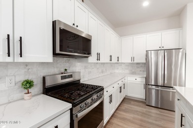 Verrado 4-bedroom home for sale in Litchfield Park with sweeping on Verrado Golf Club - Victory in Arizona - for sale on GolfHomes.com, golf home, golf lot