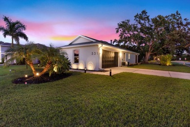 Wake up to panoramic water and fairway views from this fully on Links At Greenfield Plantation in Florida - for sale on GolfHomes.com, golf home, golf lot