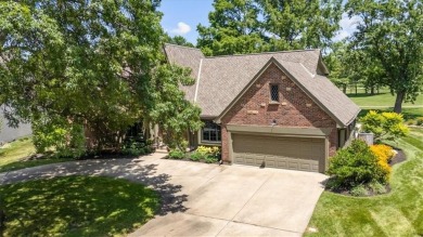 Welcome to this stunning 1.5-story Tudor-style home nestled on on Leawood South Country Club in Kansas - for sale on GolfHomes.com, golf home, golf lot