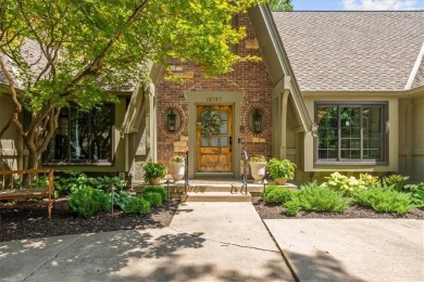 Welcome to this stunning 1.5-story Tudor-style home nestled on on Leawood South Country Club in Kansas - for sale on GolfHomes.com, golf home, golf lot