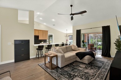 Wake up to panoramic water and fairway views from this fully on Links At Greenfield Plantation in Florida - for sale on GolfHomes.com, golf home, golf lot