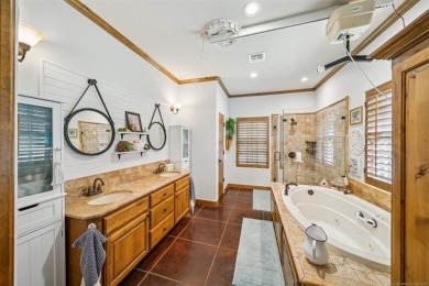 Welcome to this gorgeous home located in the sought after gated on The Coves Golf Course in Oklahoma - for sale on GolfHomes.com, golf home, golf lot