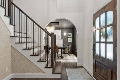 Welcome to this stunning 1.5-story Tudor-style home nestled on on Leawood South Country Club in Kansas - for sale on GolfHomes.com, golf home, golf lot