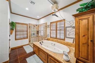 Welcome to this gorgeous home located in the sought after gated on The Coves Golf Course in Oklahoma - for sale on GolfHomes.com, golf home, golf lot