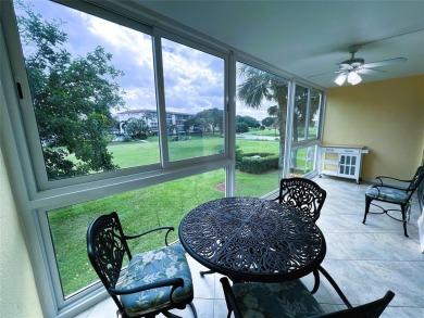 2nd FLOOR CORNER with WIDE GOLF/LAKE/POOL VIEW Plus HURRICANE on Wynmoor Golf Course in Florida - for sale on GolfHomes.com, golf home, golf lot