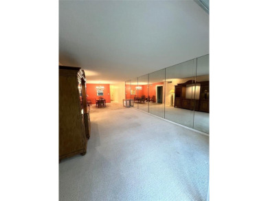 2nd FLOOR CORNER with WIDE GOLF/LAKE/POOL VIEW Plus HURRICANE on Wynmoor Golf Course in Florida - for sale on GolfHomes.com, golf home, golf lot