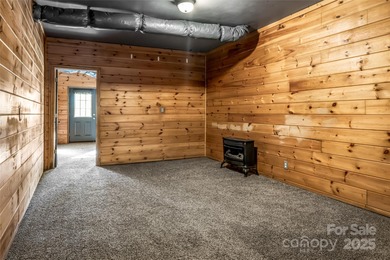 Discover Your Mountain Retreat in Wolf Laurel! Escape to the on Wolf Laurel Country Club in North Carolina - for sale on GolfHomes.com, golf home, golf lot