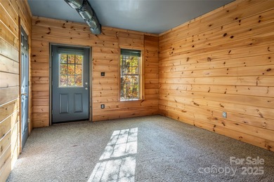 Discover Your Mountain Retreat in Wolf Laurel! Escape to the on Wolf Laurel Country Club in North Carolina - for sale on GolfHomes.com, golf home, golf lot