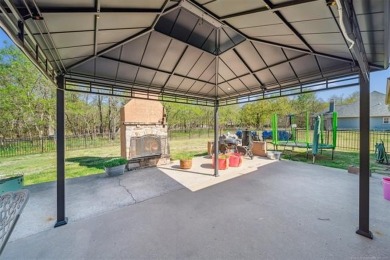 Welcome to this gorgeous home located in the sought after gated on The Coves Golf Course in Oklahoma - for sale on GolfHomes.com, golf home, golf lot