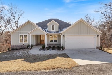 This stunning single-story home offers 4 spacious bedrooms, 3 on Bella Vista Country Club - Berksdale in Arkansas - for sale on GolfHomes.com, golf home, golf lot