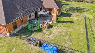 Welcome to this gorgeous home located in the sought after gated on The Coves Golf Course in Oklahoma - for sale on GolfHomes.com, golf home, golf lot