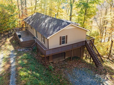 Discover Your Mountain Retreat in Wolf Laurel! Escape to the on Wolf Laurel Country Club in North Carolina - for sale on GolfHomes.com, golf home, golf lot