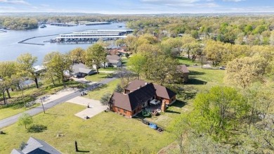 Welcome to this gorgeous home located in the sought after gated on The Coves Golf Course in Oklahoma - for sale on GolfHomes.com, golf home, golf lot