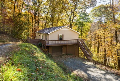 Discover Your Mountain Retreat in Wolf Laurel! Escape to the on Wolf Laurel Country Club in North Carolina - for sale on GolfHomes.com, golf home, golf lot