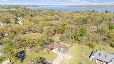 Welcome to this gorgeous home located in the sought after gated on The Coves Golf Course in Oklahoma - for sale on GolfHomes.com, golf home, golf lot