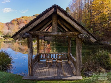 Discover Your Mountain Retreat in Wolf Laurel! Escape to the on Wolf Laurel Country Club in North Carolina - for sale on GolfHomes.com, golf home, golf lot