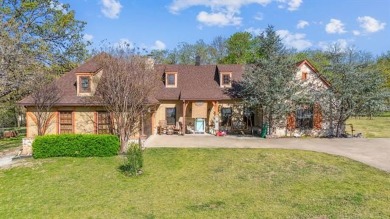 Welcome to this gorgeous home located in the sought after gated on The Coves Golf Course in Oklahoma - for sale on GolfHomes.com, golf home, golf lot