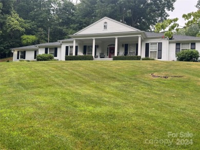 This one-of-a-kind Country Club Classic offers one-level living on Waynesville Country Club Inn in North Carolina - for sale on GolfHomes.com, golf home, golf lot