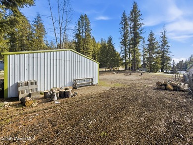 Build your dream home or vacation getaway on this close-to-town on Twin Lakes Village Golf Course in Idaho - for sale on GolfHomes.com, golf home, golf lot