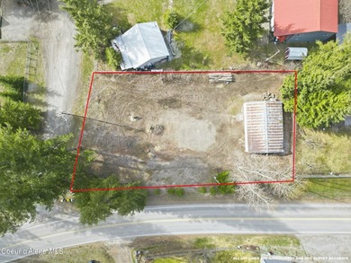 Build your dream home or vacation getaway on this close-to-town on Twin Lakes Village Golf Course in Idaho - for sale on GolfHomes.com, golf home, golf lot