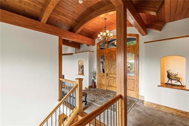This exceptional 4-bedroom, 5-bathroom mountain retreat offers on Raven Golf Club At Three Peaks in Colorado - for sale on GolfHomes.com, golf home, golf lot