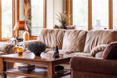 This exceptional 4-bedroom, 5-bathroom mountain retreat offers on Raven Golf Club At Three Peaks in Colorado - for sale on GolfHomes.com, golf home, golf lot