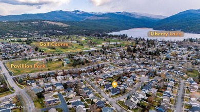 Freshly updated and move-in ready! This expansive 4,120 SF home on Trailhead At Liberty Lake in Washington - for sale on GolfHomes.com, golf home, golf lot