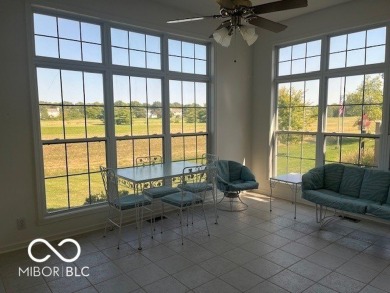 This lovely home enjoys a panoramic view of the Plum Creek Golf on Plum Creek Golf Club in Indiana - for sale on GolfHomes.com, golf home, golf lot